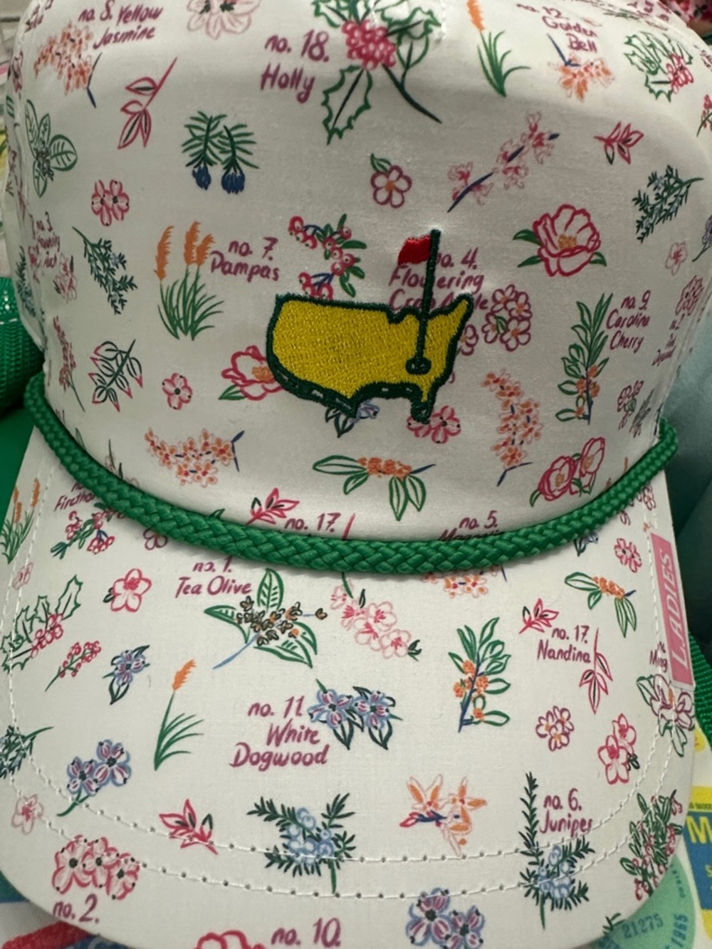 Masters White Floral Cap with Yellow & Red Embroided Emblem and Green Trim